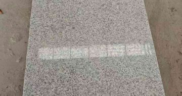 鹤岗芝麻白光面毛板