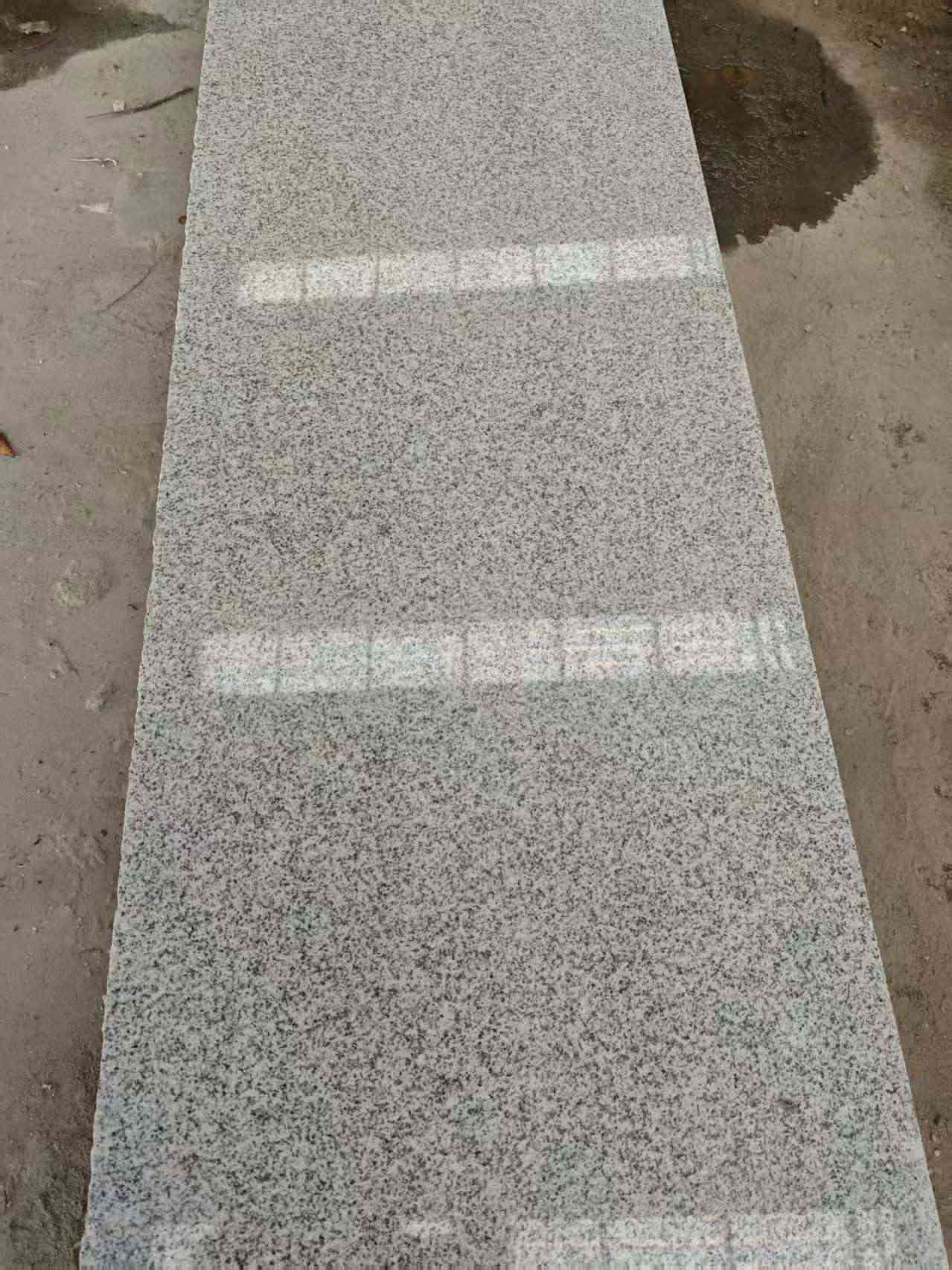 鹤岗芝麻白光面毛板